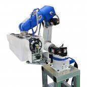 The Shibaura Machine TVM900 6-axis robot integrates seamlessly with Roboprint’s print head for high-speed, automated decoration.